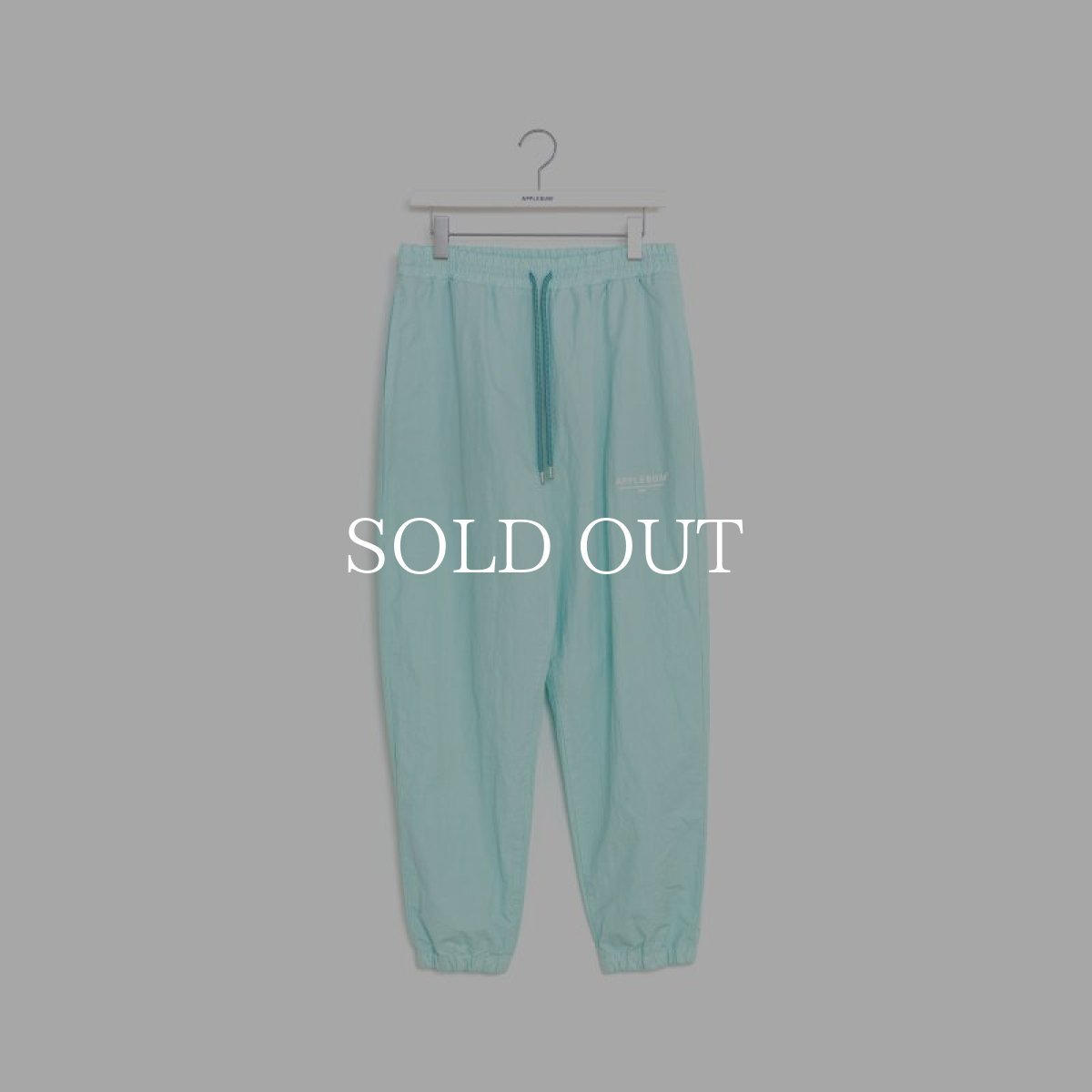 画像1: APPLEBUM  Dyed Cotton Nylon Track Pants (Turquoise) (1)